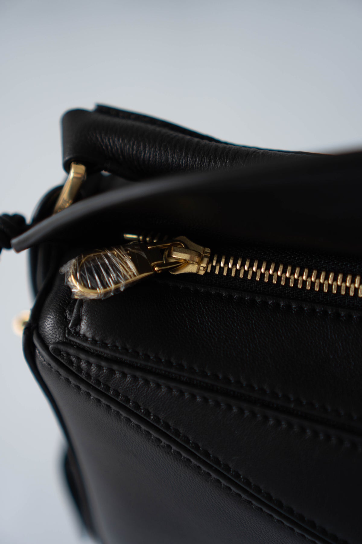 Puzzle Small Bag – Black Satin Calfskin Leather with Gold Hardware