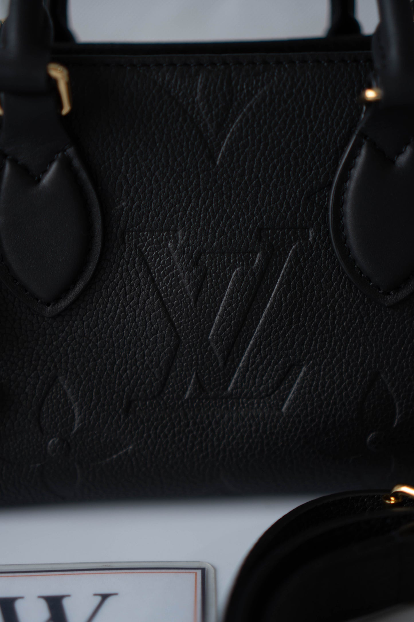 On-The-Go East West – Black Monogram Empreinte Leather with Gold Hardware