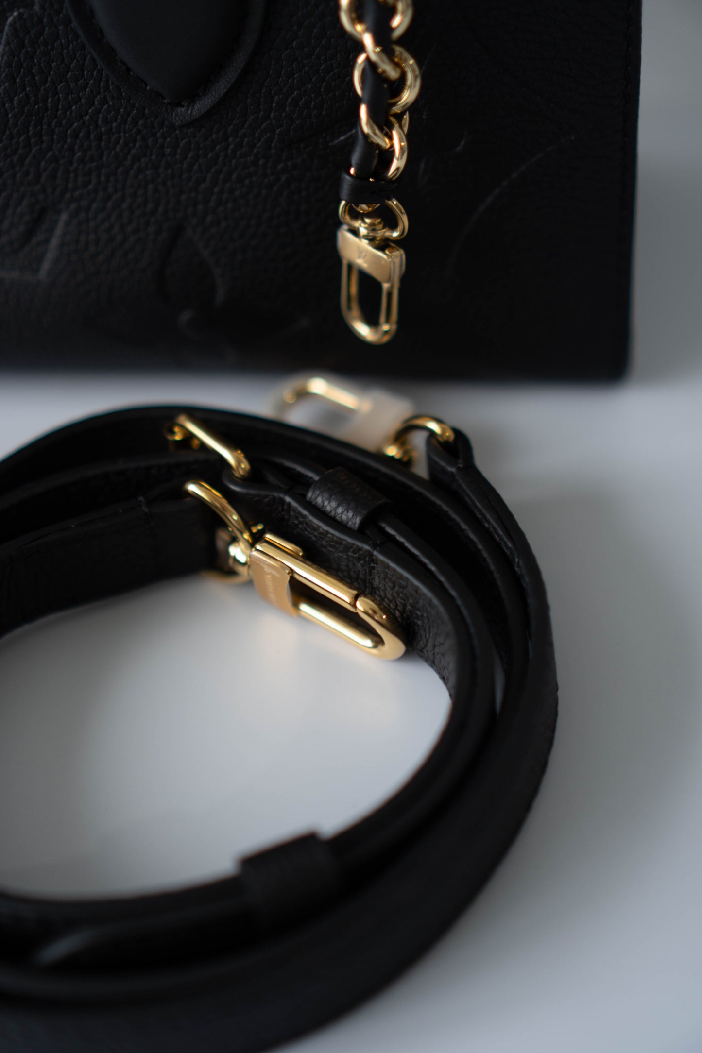 On-The-Go East West – Black Monogram Empreinte Leather with Gold Hardware