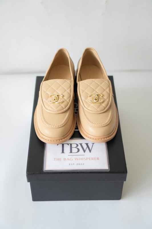 Quilted CC Turnlock Moccasin Loafers in Beige