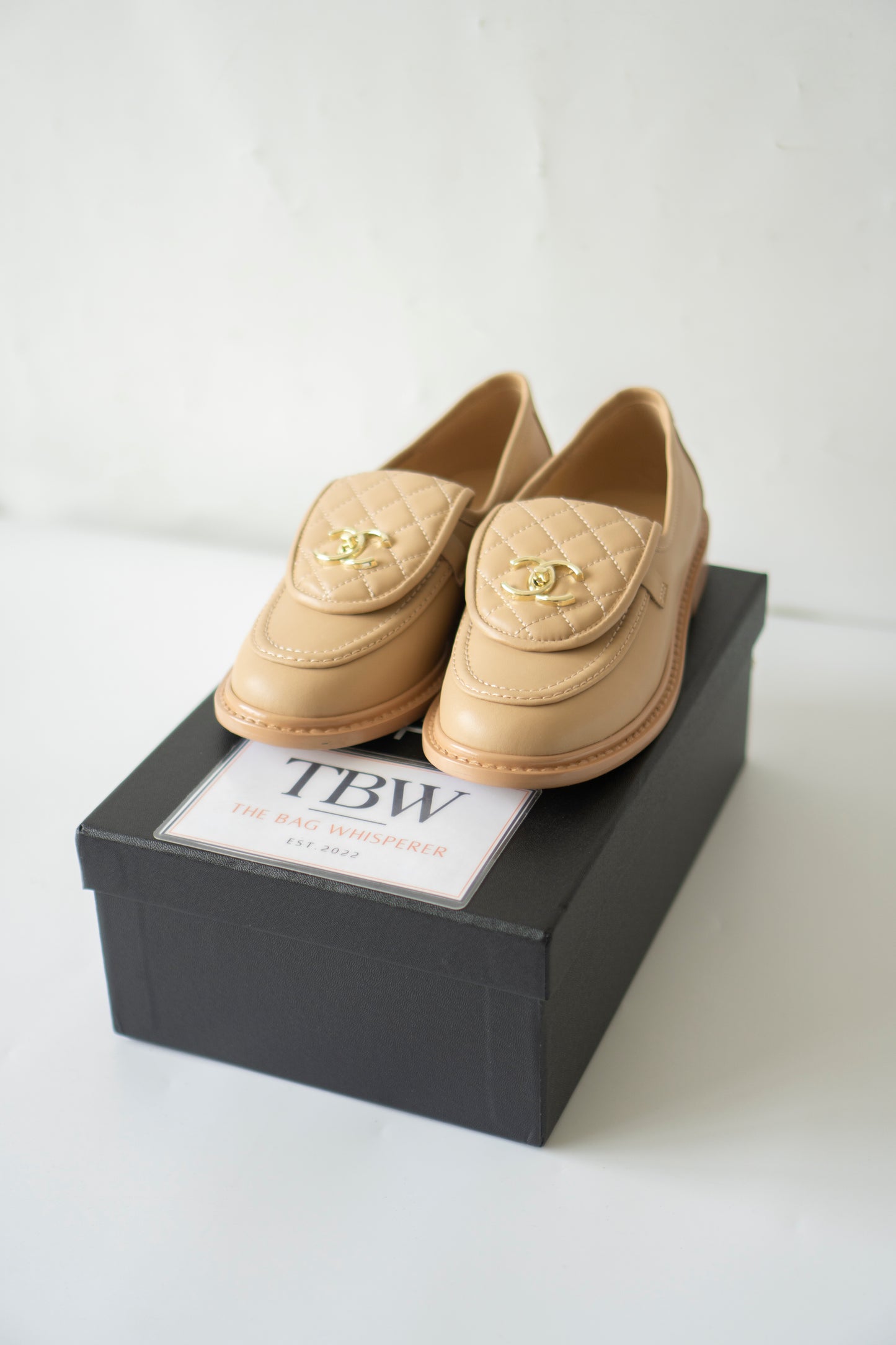 Quilted CC Turnlock Moccasin Loafers in Beige