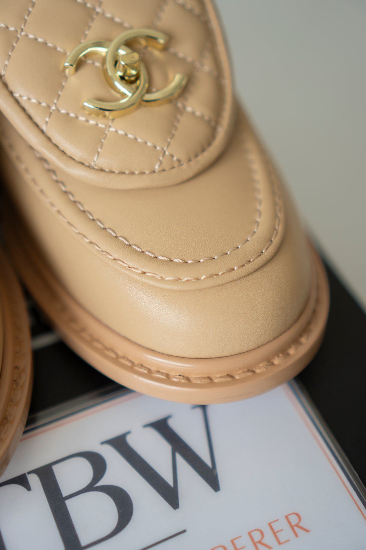 Quilted CC Turnlock Moccasin Loafers in Beige