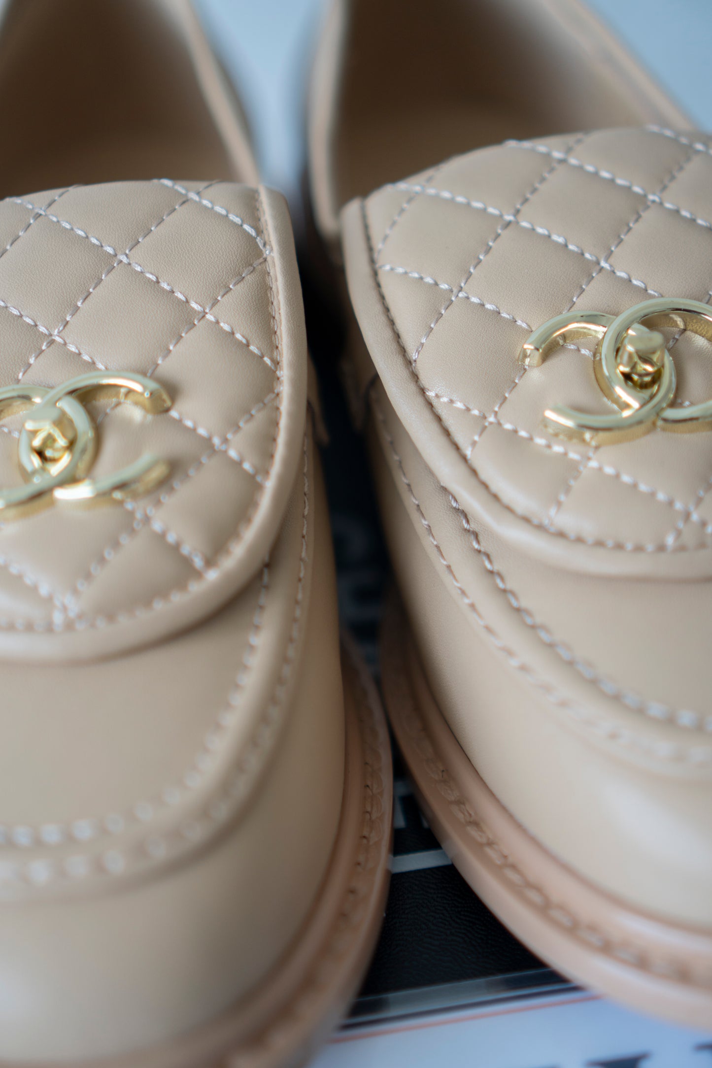 Quilted CC Turnlock Moccasin Loafers in Beige