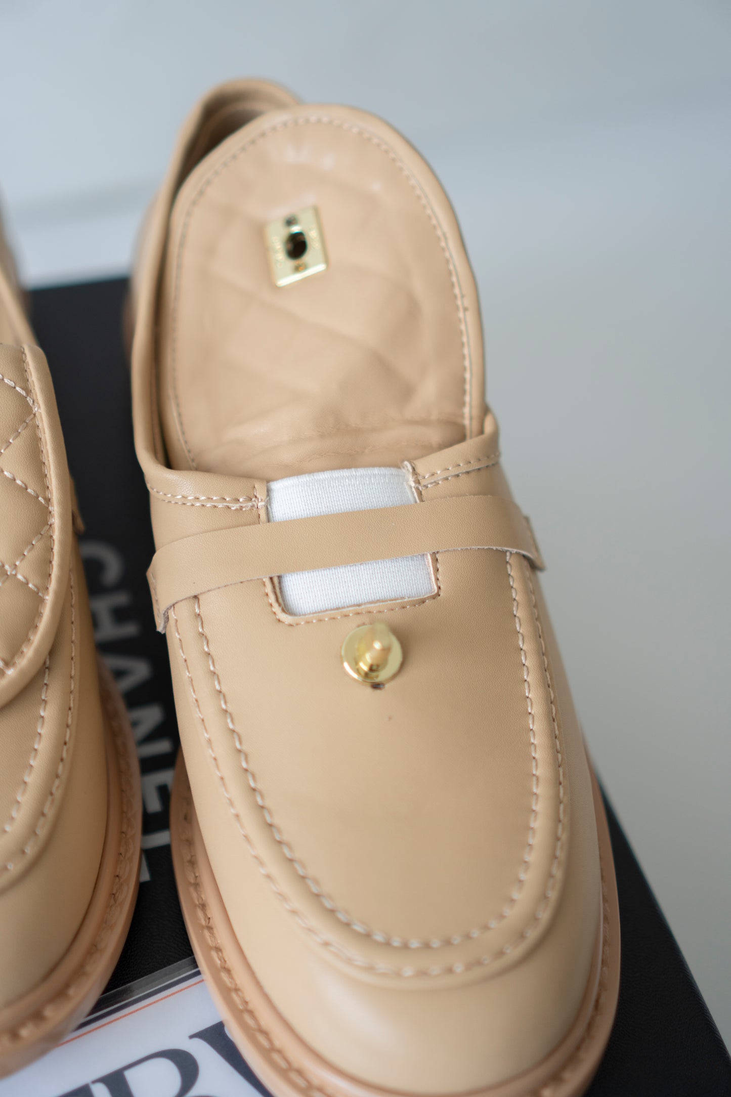 Quilted CC Turnlock Moccasin Loafers in Beige