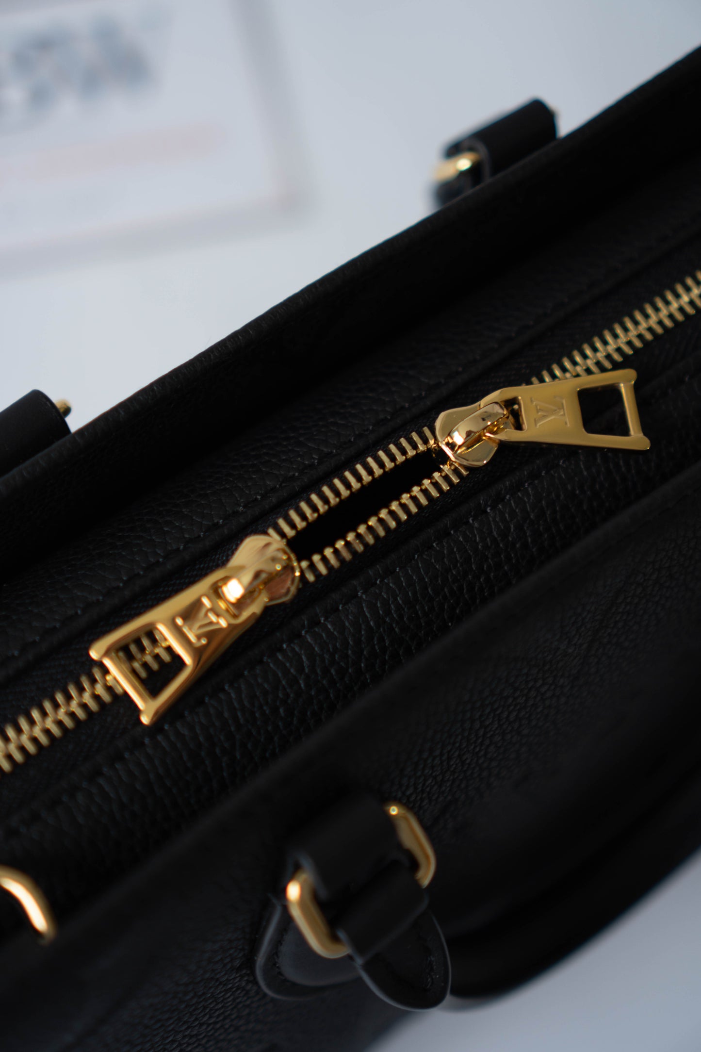 On-The-Go East West – Black Monogram Empreinte Leather with Gold Hardware