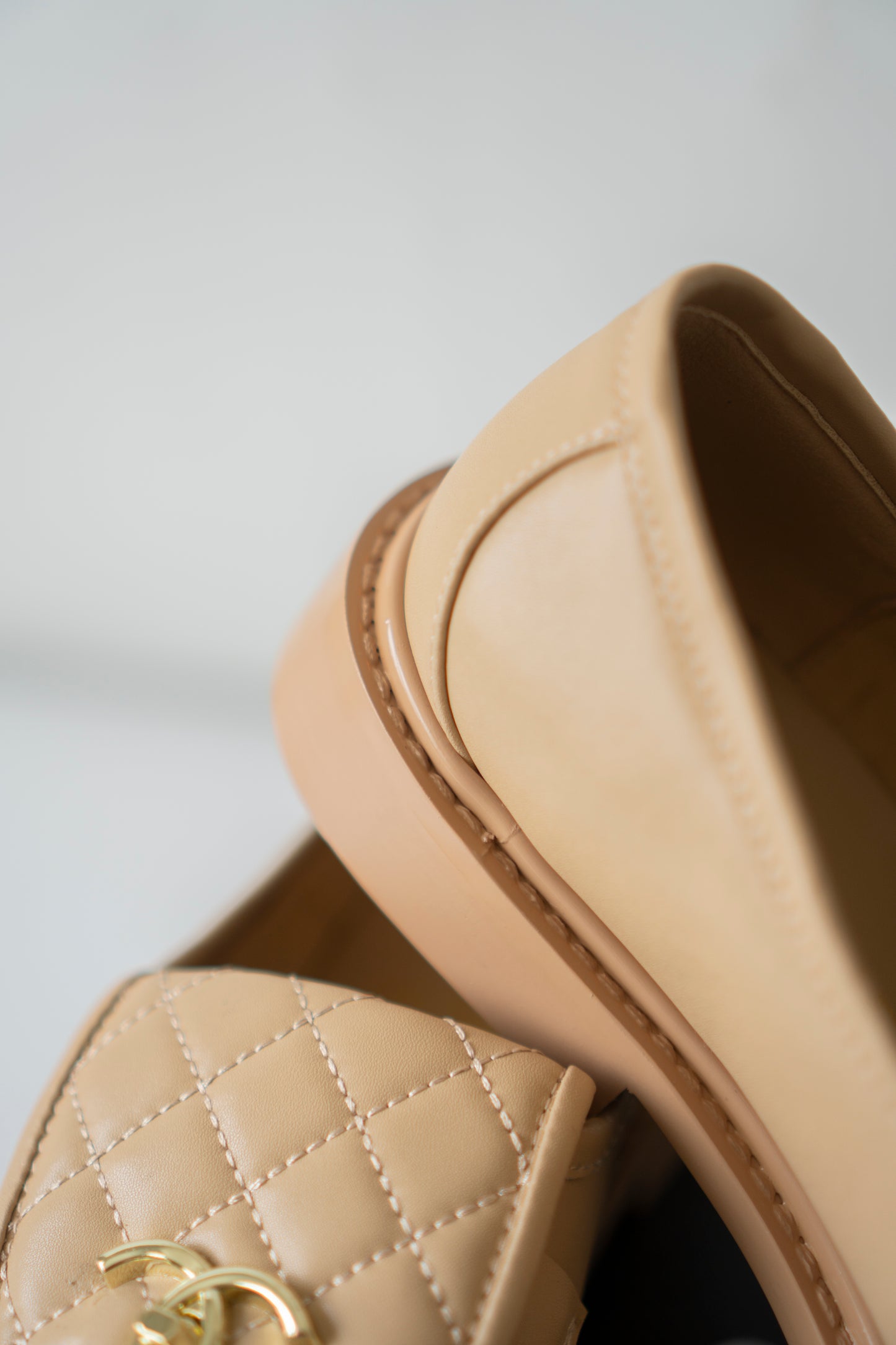 Quilted CC Turnlock Moccasin Loafers in Beige