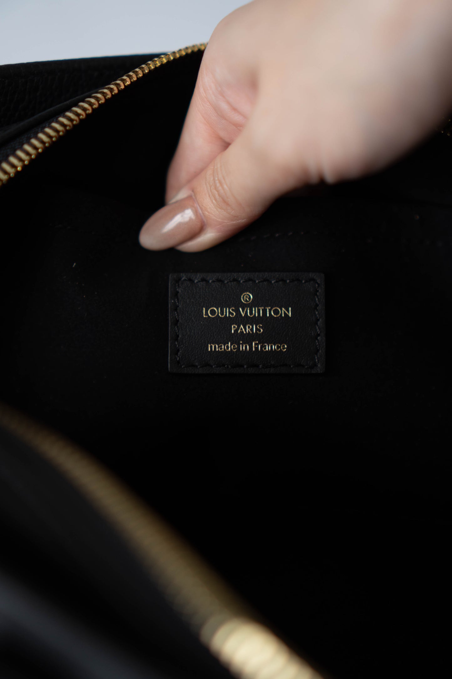 On-The-Go East West – Black Monogram Empreinte Leather with Gold Hardware