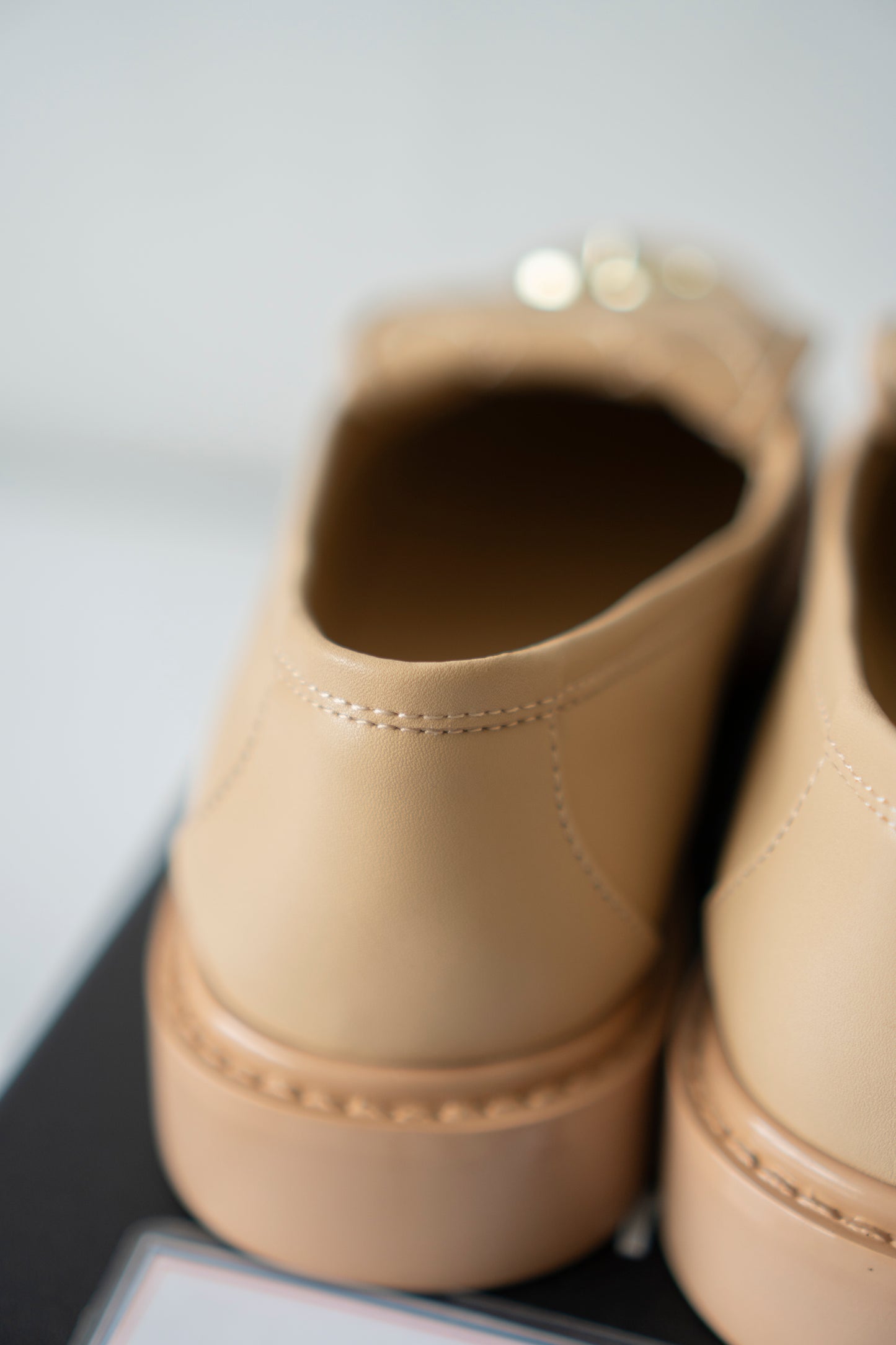 Quilted CC Turnlock Moccasin Loafers in Beige