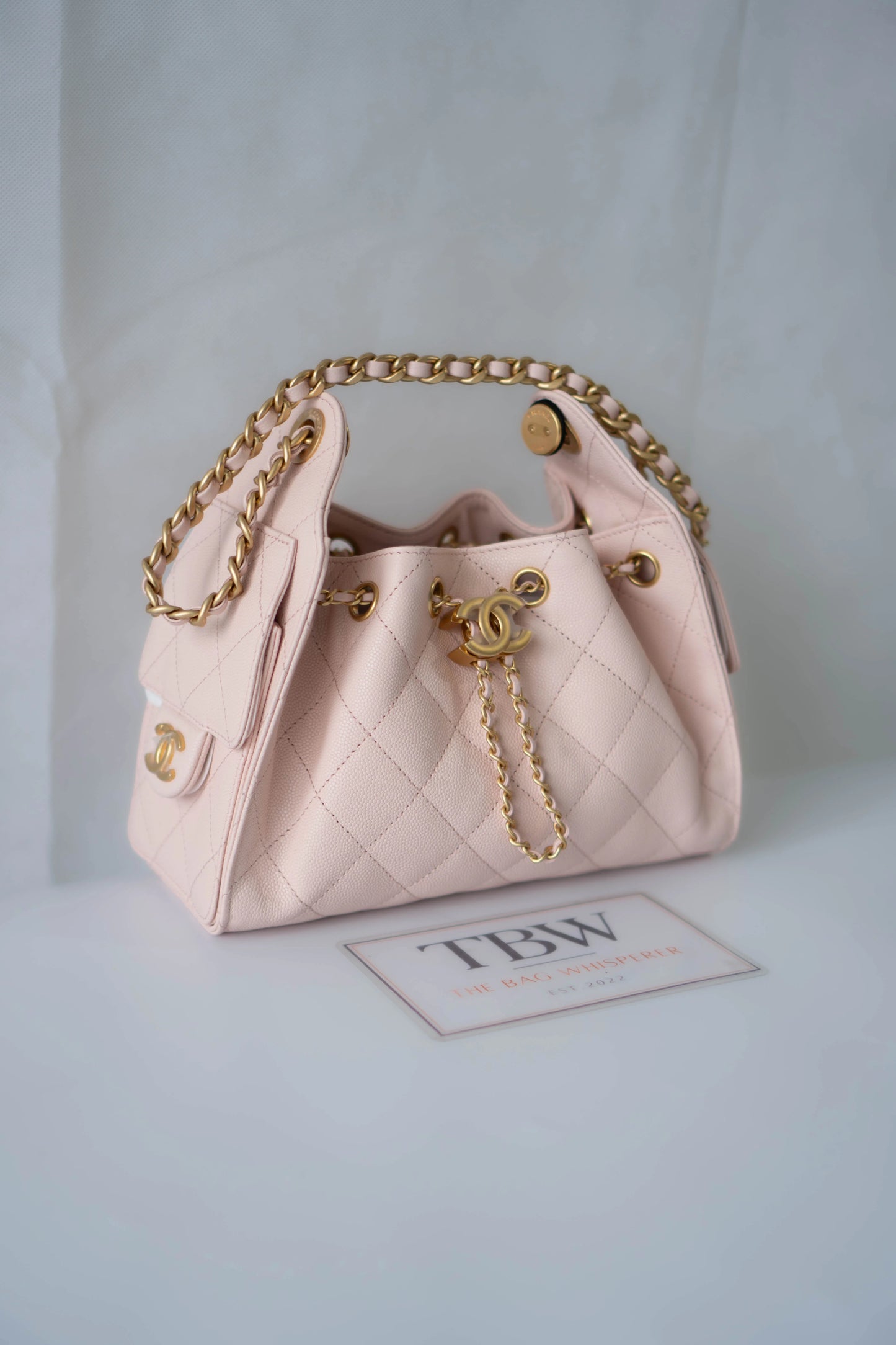 CC Small Drawstring Bucket Bag – Light Pink Caviar Leather with Gold Hardware