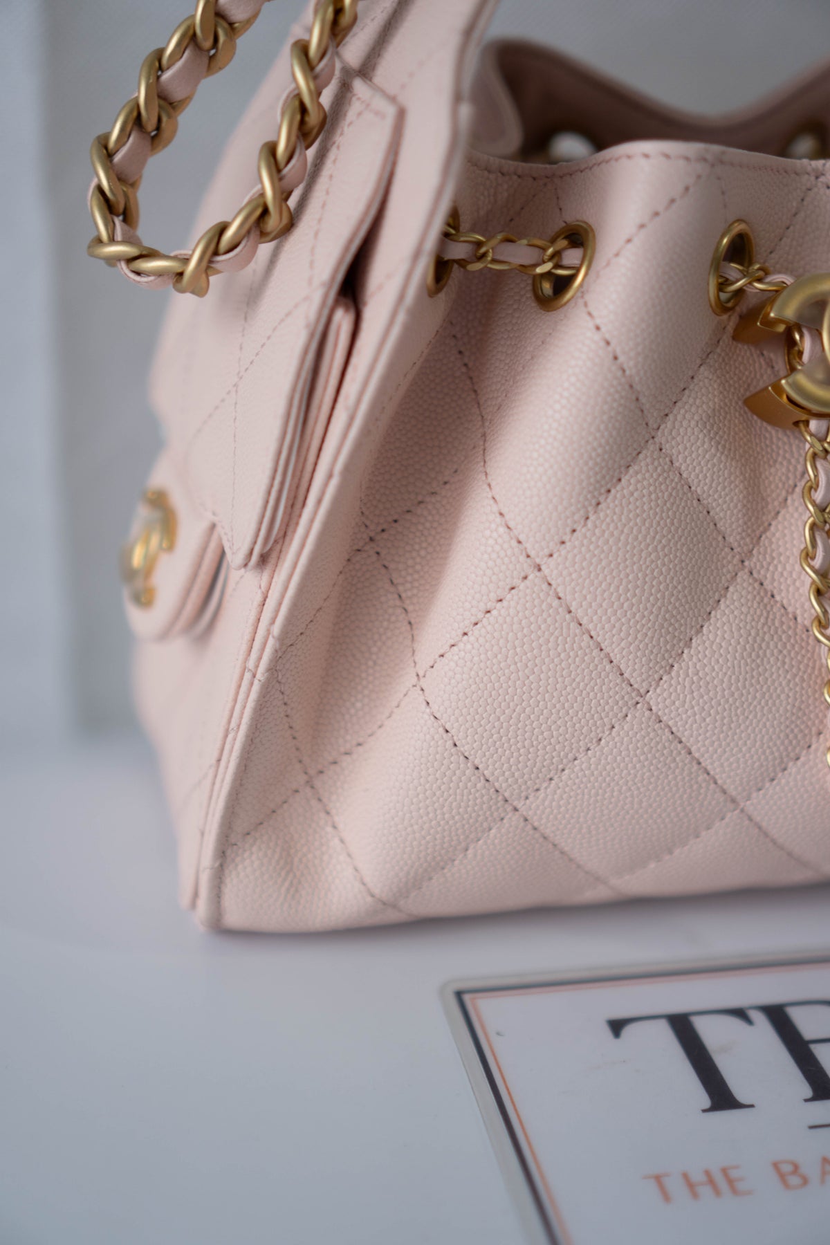 CC Small Drawstring Bucket Bag – Light Pink Caviar Leather with Gold Hardware
