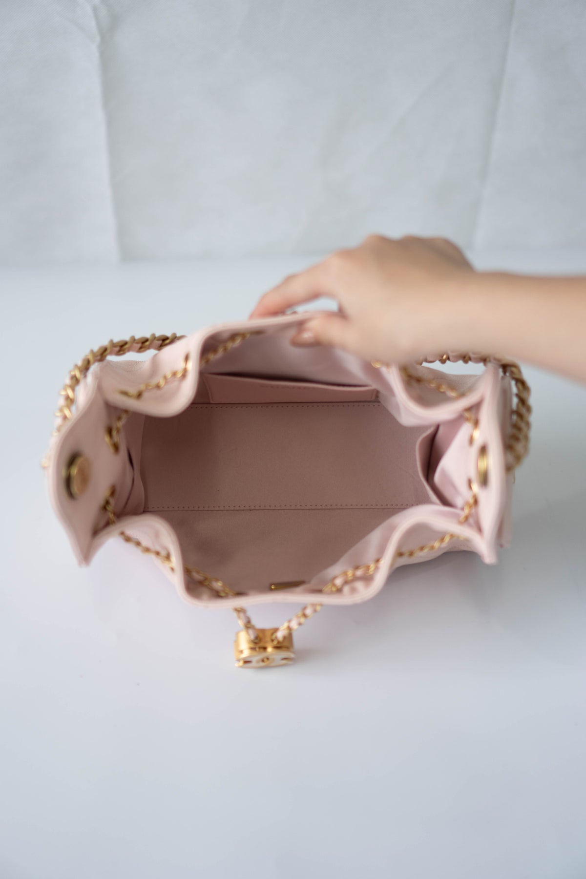 CC Small Drawstring Bucket Bag – Light Pink Caviar Leather with Gold Hardware
