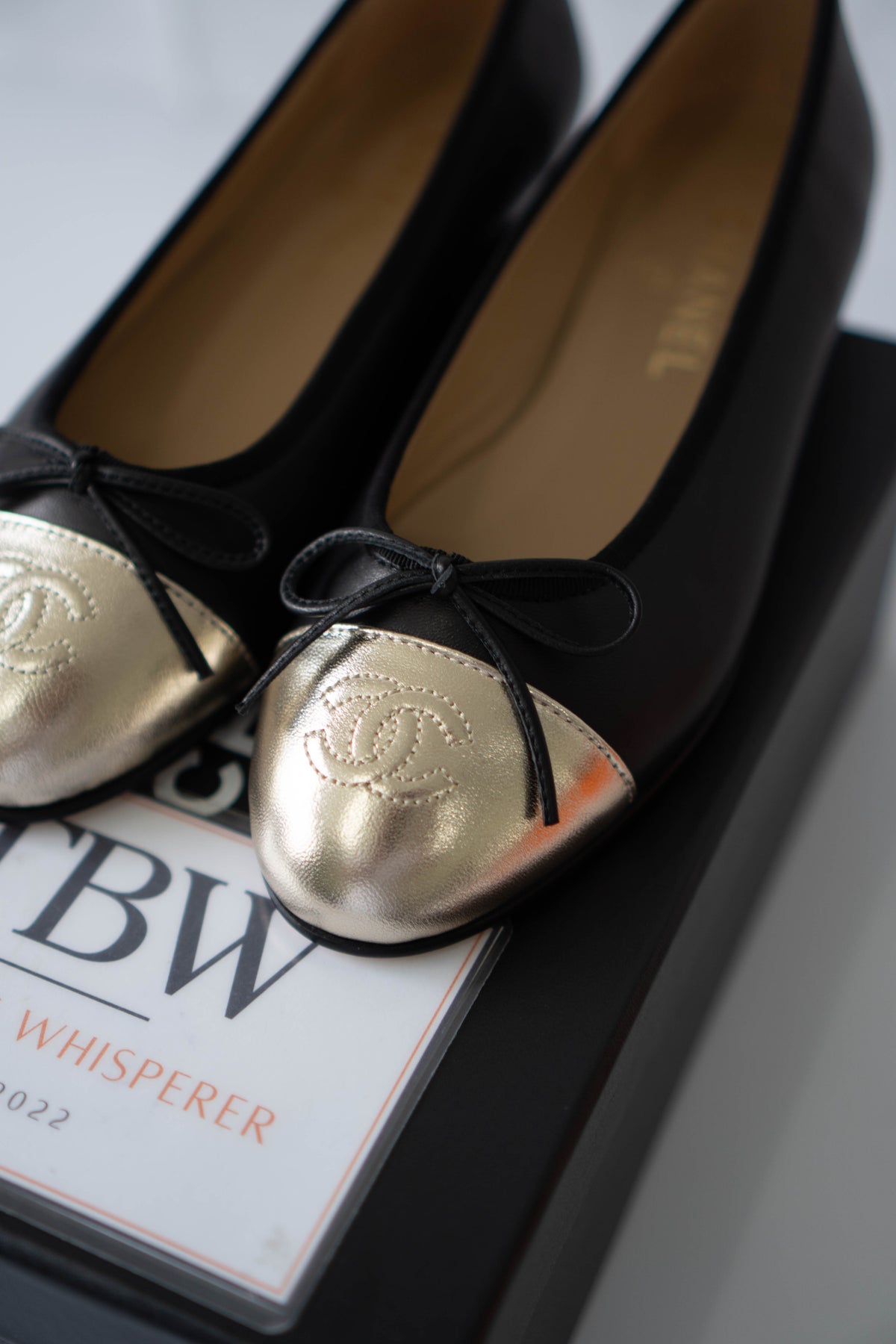 Classic Ballerina Flats – Black Lambskin with Metallic Gold Toe Cap