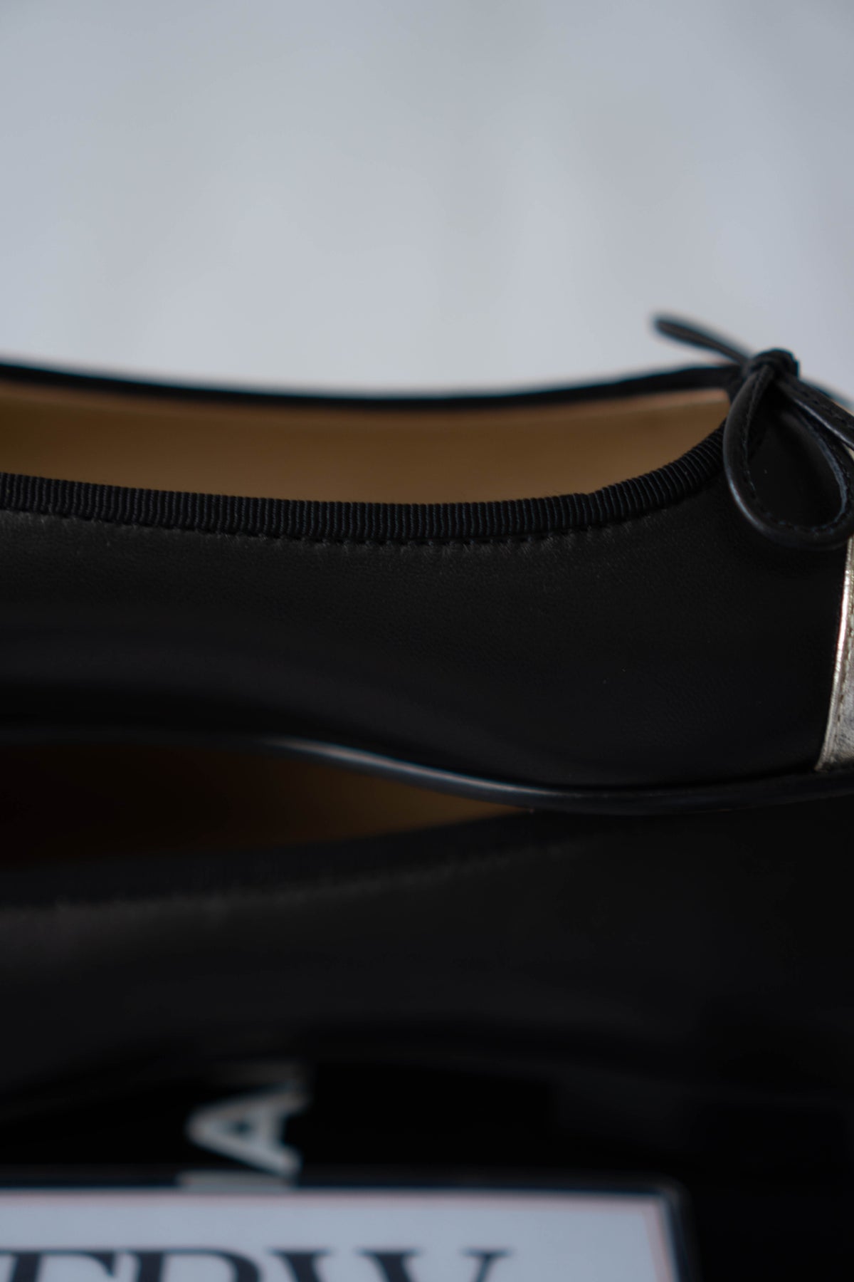 Classic Ballerina Flats – Black Lambskin with Metallic Gold Toe Cap