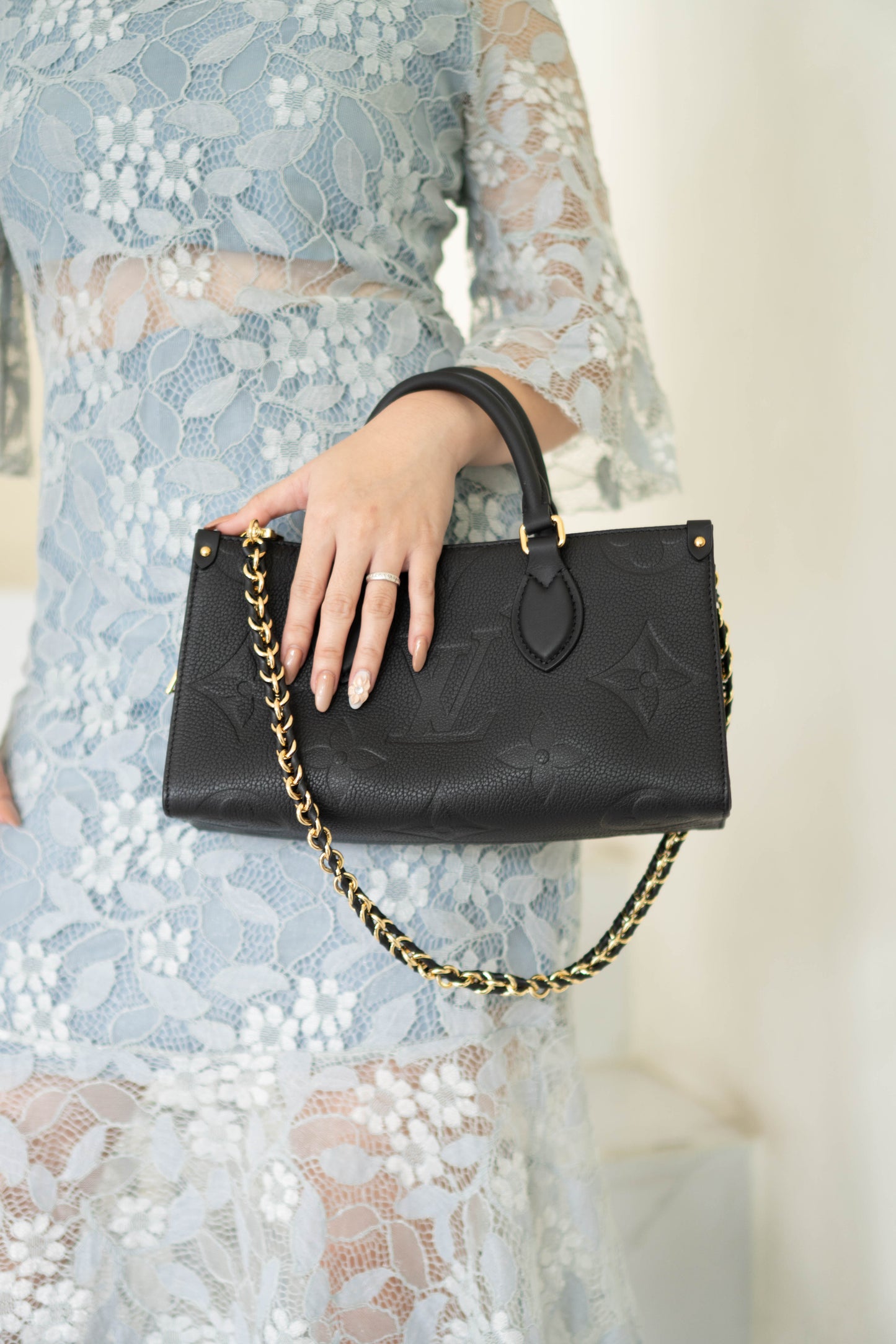 On-The-Go East West – Black Monogram Empreinte Leather with Gold Hardware