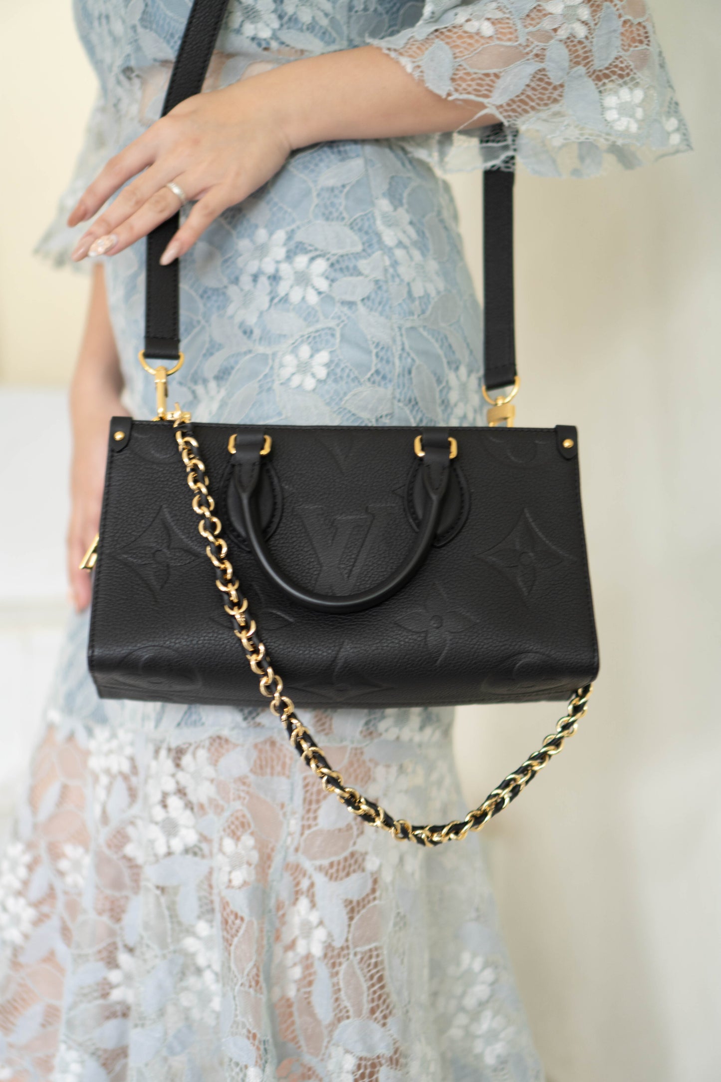 On-The-Go East West – Black Monogram Empreinte Leather with Gold Hardware