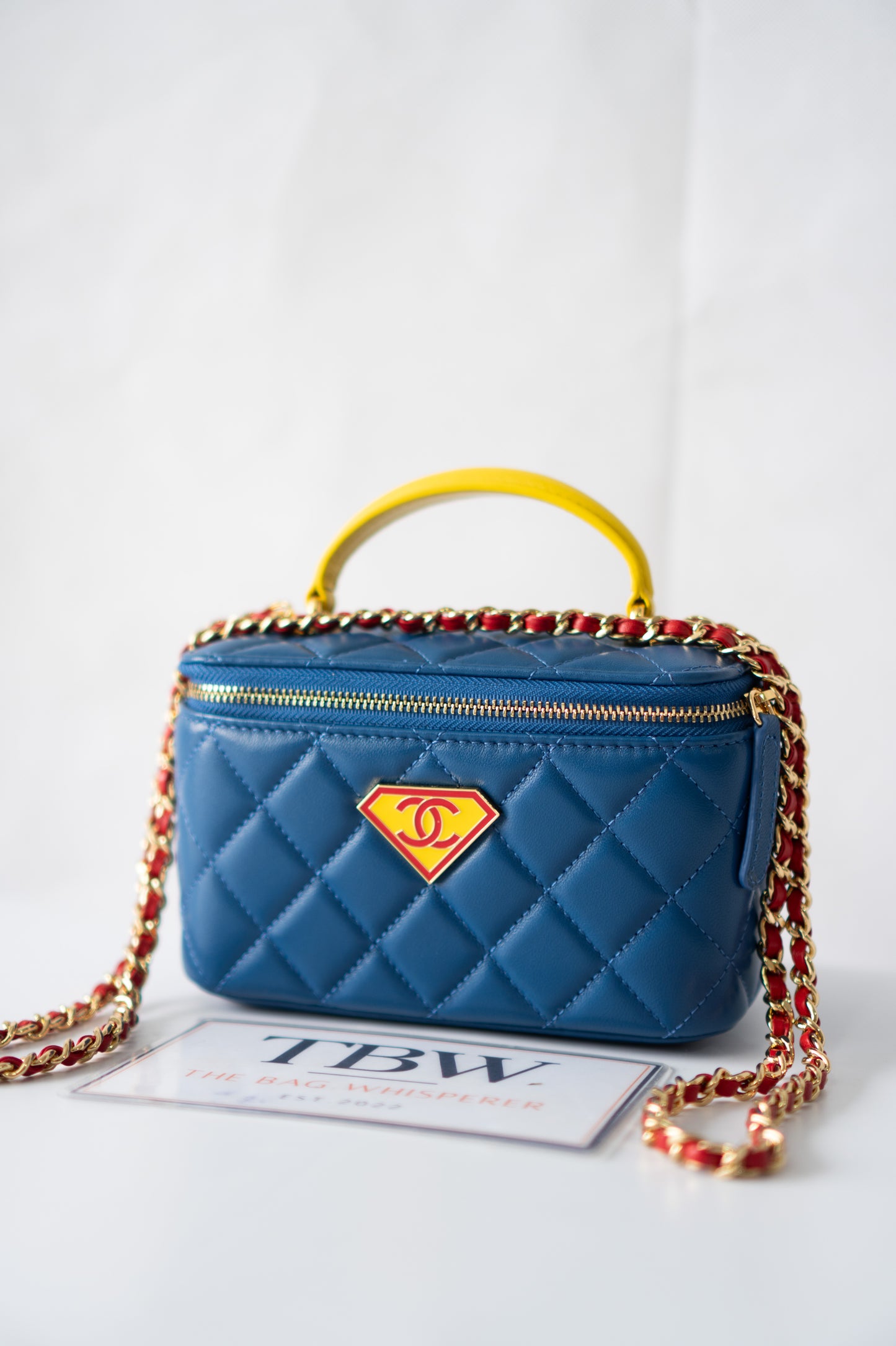 Small Vanity Case (Superman) with Top Handle – Blue Quilted Lambskin with Superhero Emblem &amp; Gold Hardware
