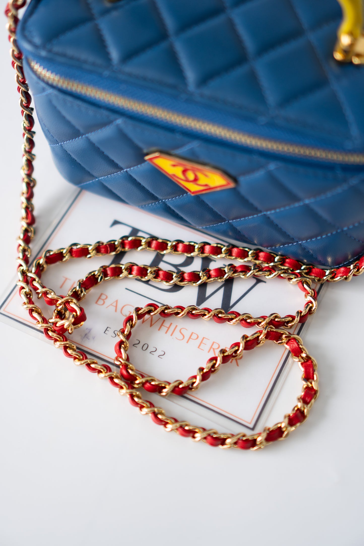 Small Vanity Case (Superman) with Top Handle – Blue Quilted Lambskin with Superhero Emblem &amp; Gold Hardware
