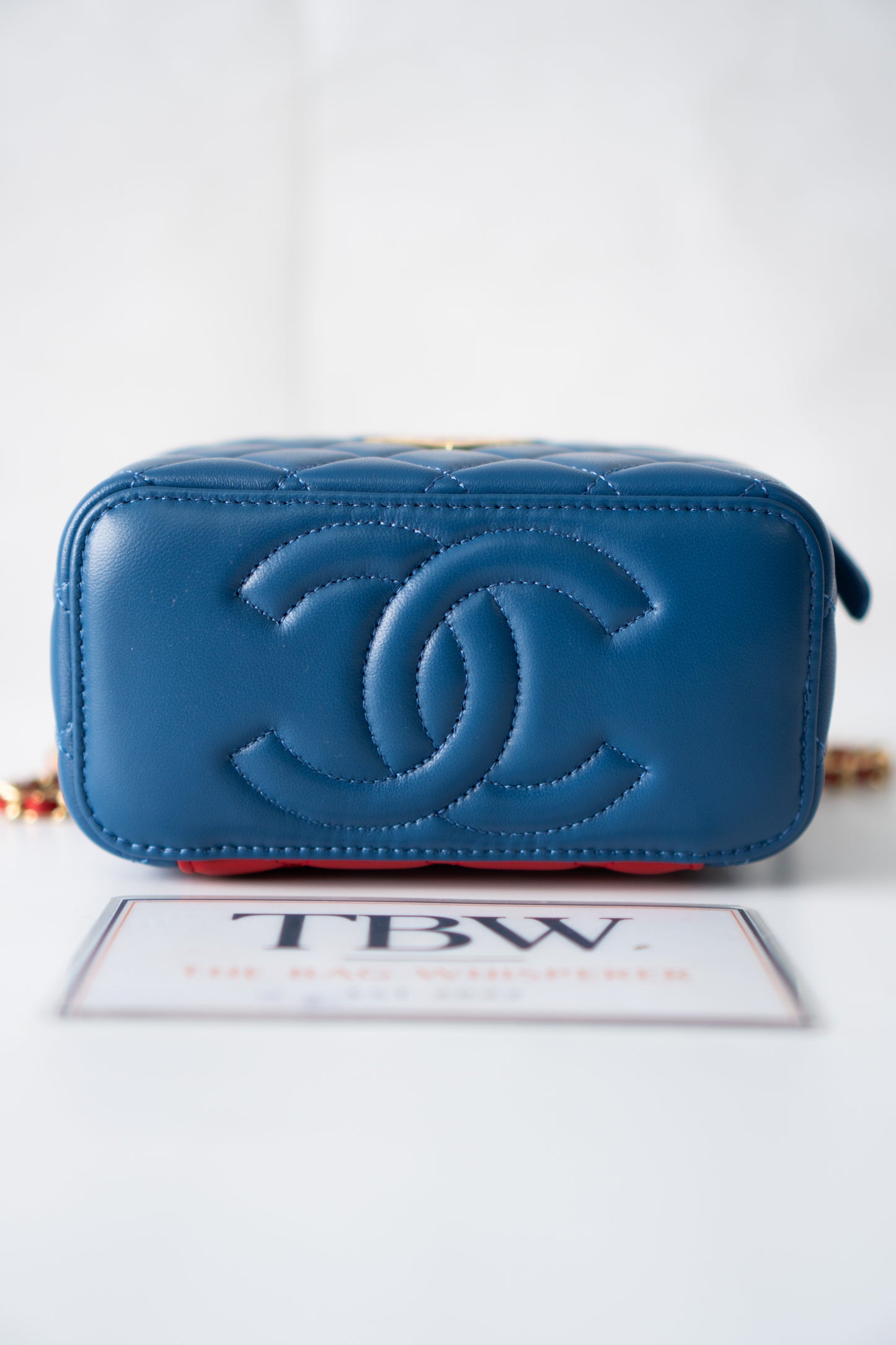 Small Vanity Case (Superman) with Top Handle – Blue Quilted Lambskin with Superhero Emblem &amp; Gold Hardware