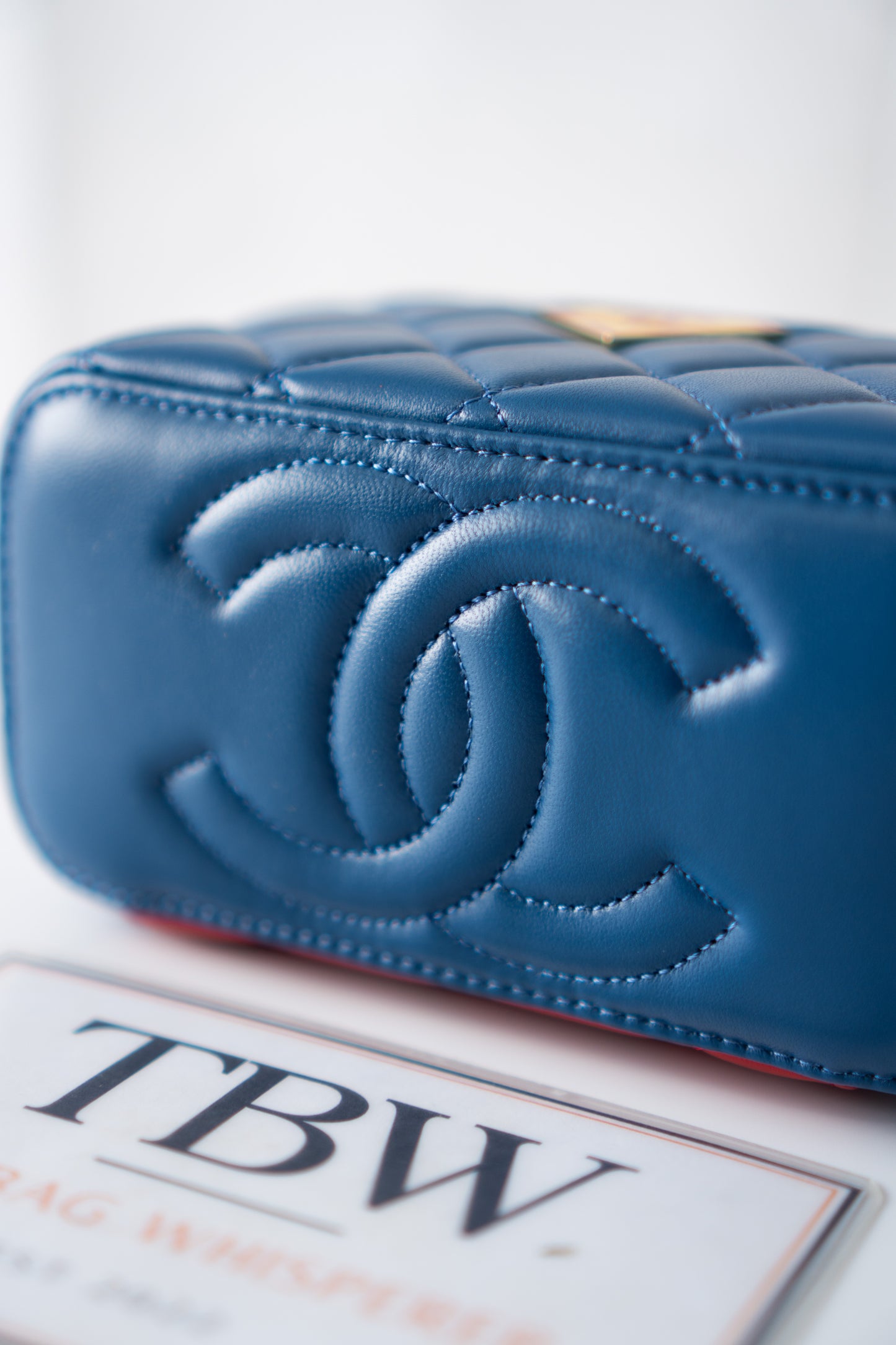 Small Vanity Case (Superman) with Top Handle – Blue Quilted Lambskin with Superhero Emblem &amp; Gold Hardware
