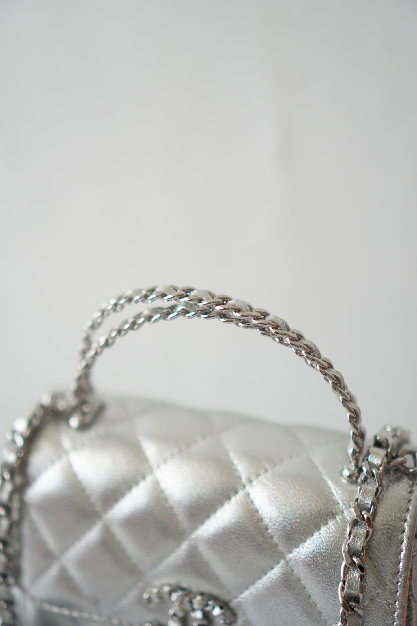 Mini Kelly Shopping Bag – Metallic Silver Quilted Lambskin with Silver Hardware