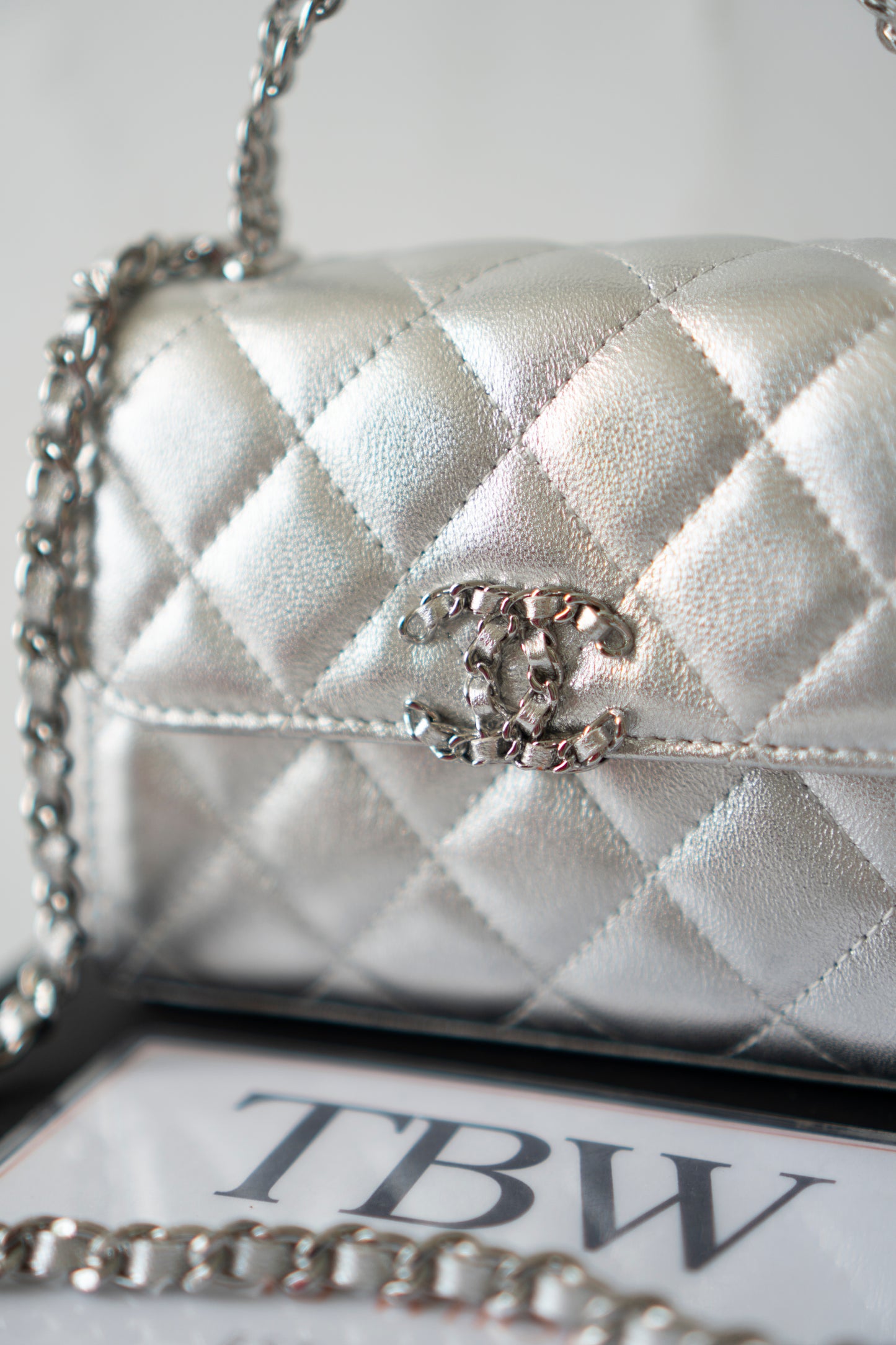 Mini Kelly Shopping Bag – Metallic Silver Quilted Lambskin with Silver Hardware