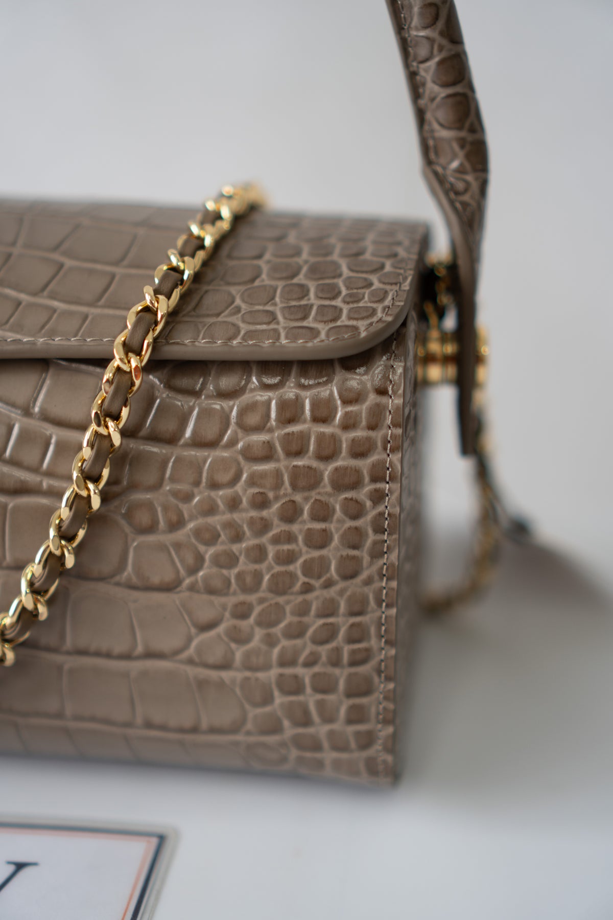 East-West Flap Bag with Top Handle – Grey Croc-Embossed Calfskin Leather with Gold Hardware