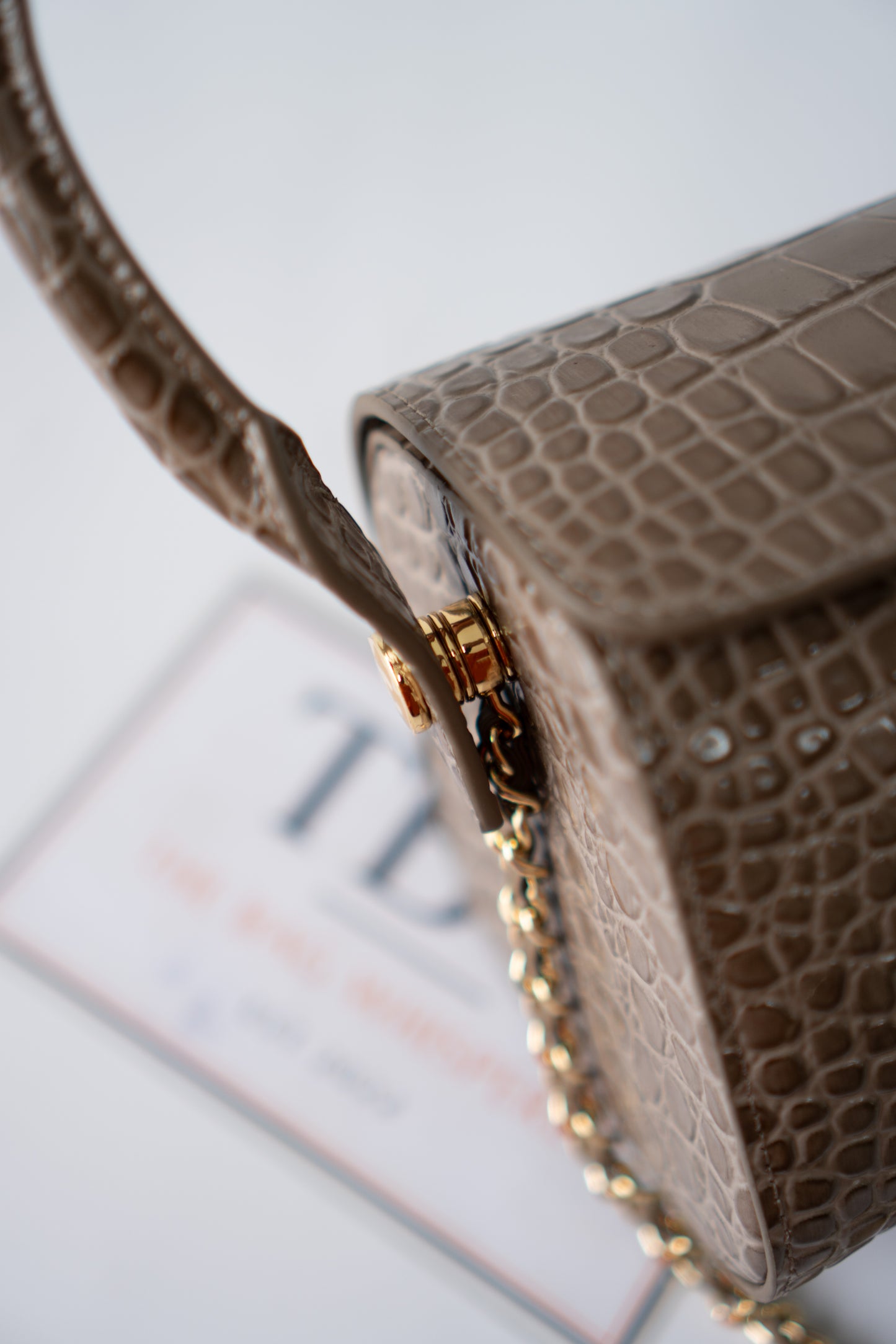 East-West Flap Bag with Top Handle – Grey Croc-Embossed Calfskin Leather with Gold Hardware