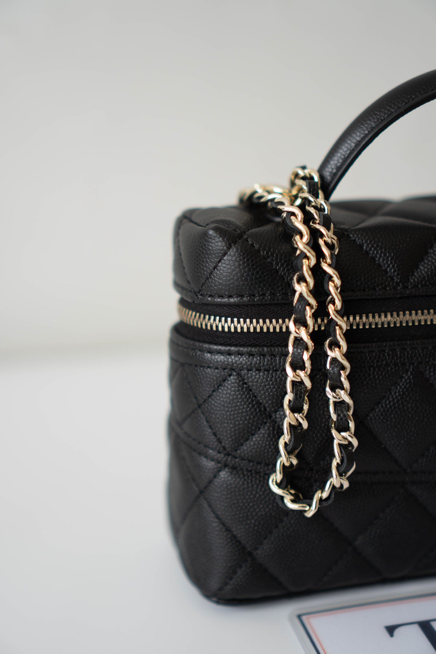 Top Handle Slim Vanity Case – Black Quilted Leather with Gold Hardware