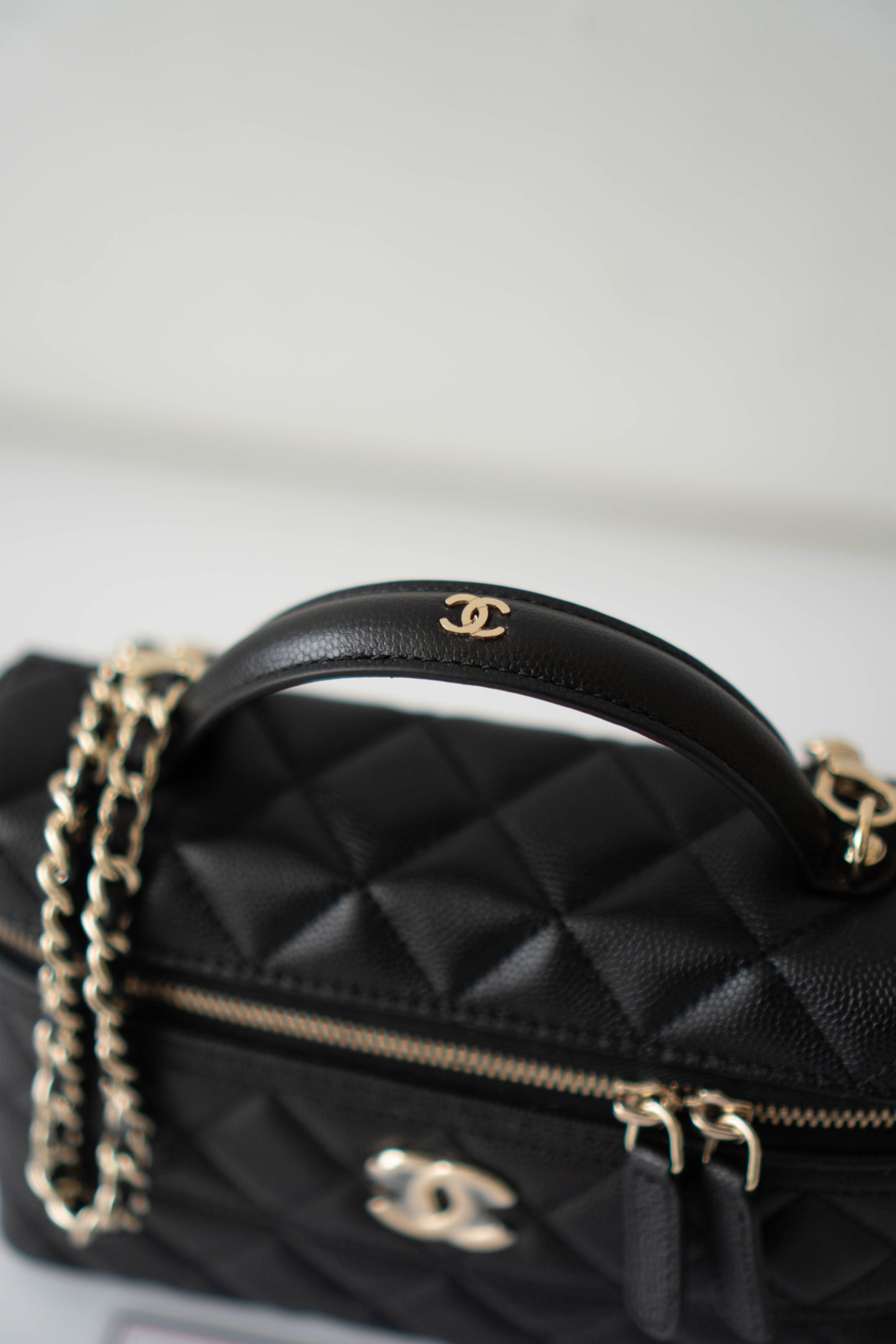 Top Handle Slim Vanity Case – Black Quilted Leather with Gold Hardware