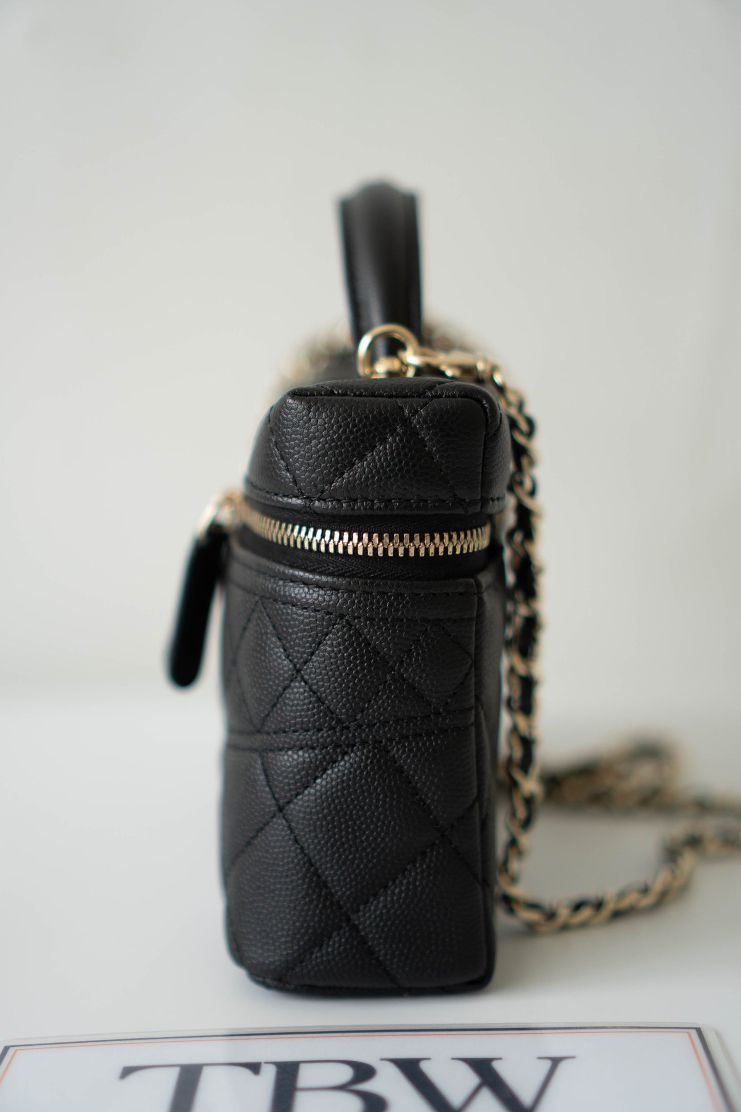 Top Handle Slim Vanity Case – Black Quilted Leather with Gold Hardware
