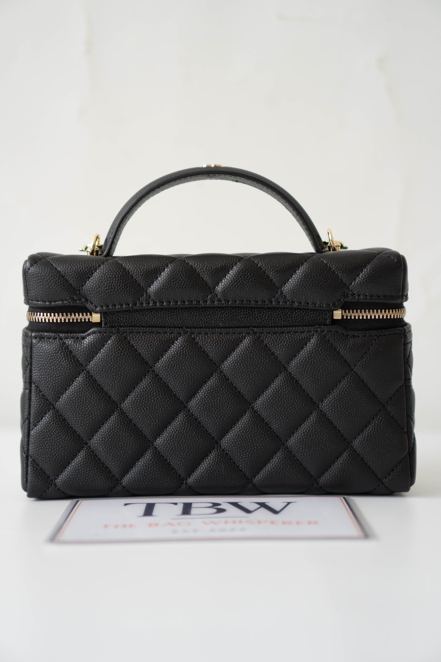 Top Handle Slim Vanity Case – Black Quilted Leather with Gold Hardware