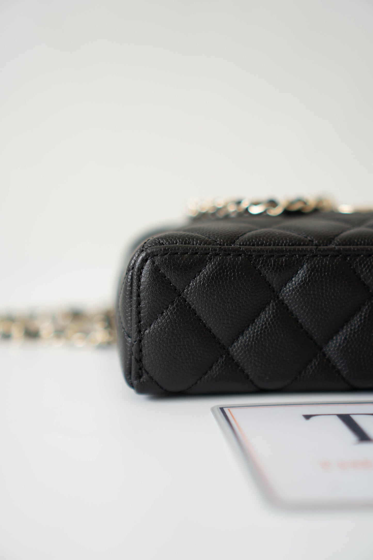 Top Handle Slim Vanity Case – Black Quilted Leather with Gold Hardware