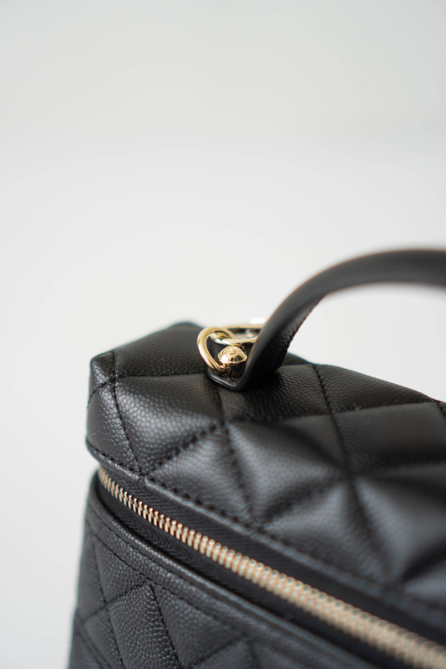 Top Handle Slim Vanity Case – Black Quilted Leather with Gold Hardware