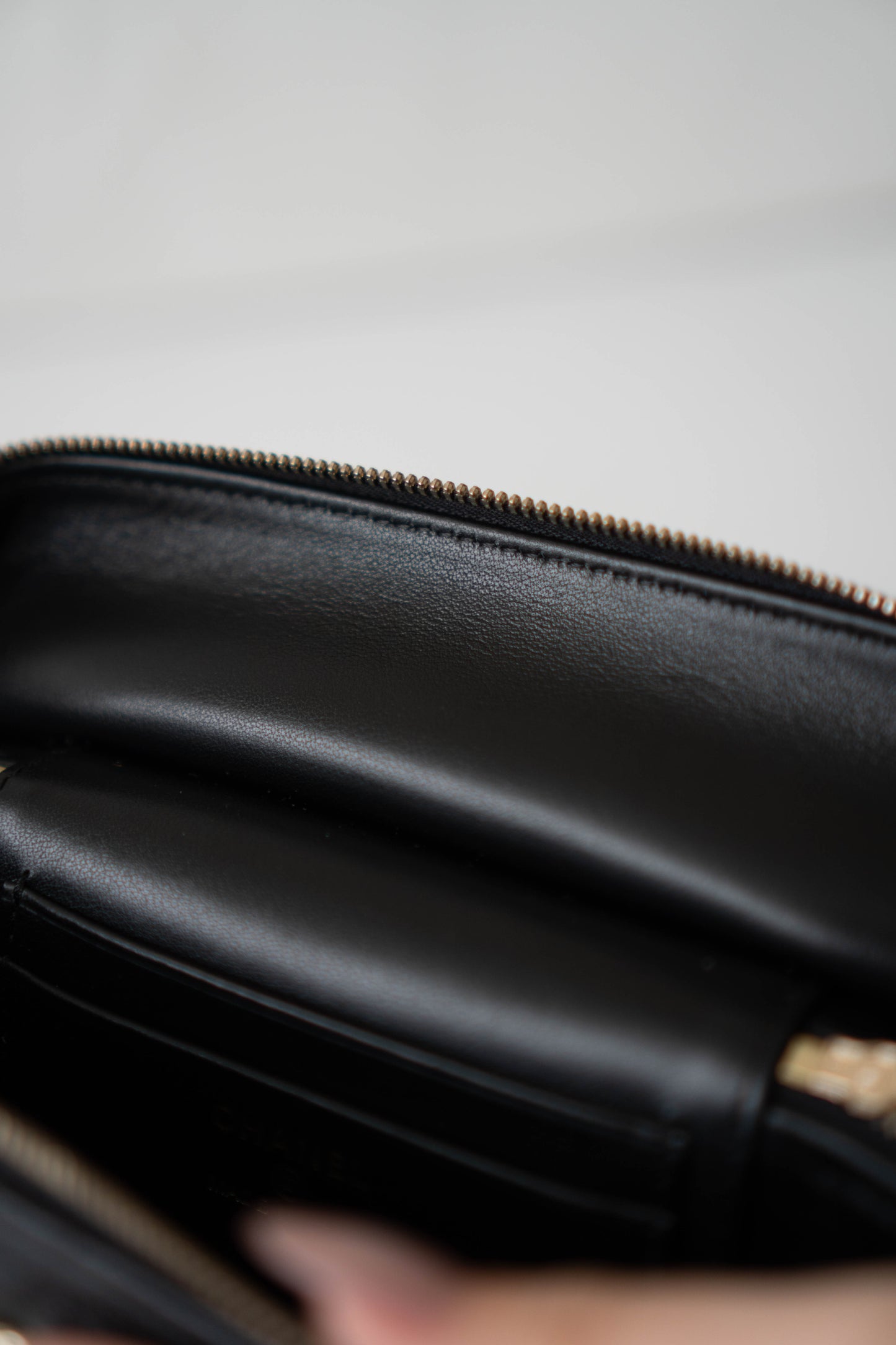 Top Handle Slim Vanity Case – Black Quilted Leather with Gold Hardware