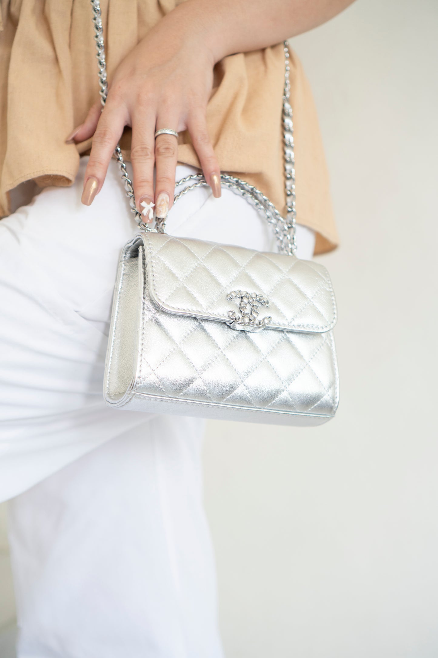 Mini Kelly Shopping Bag – Metallic Silver Quilted Lambskin with Silver Hardware