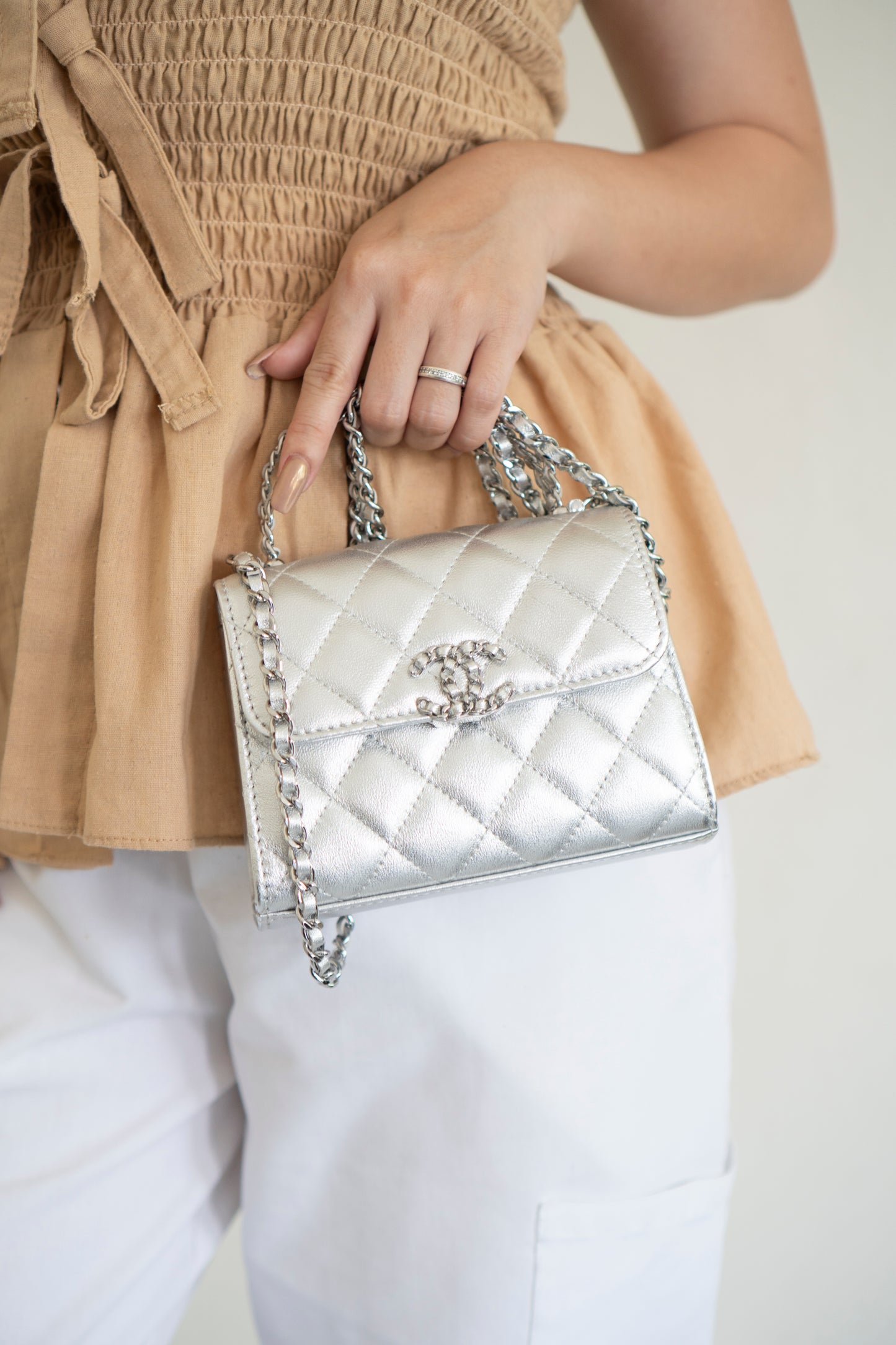 Mini Kelly Shopping Bag – Metallic Silver Quilted Lambskin with Silver Hardware