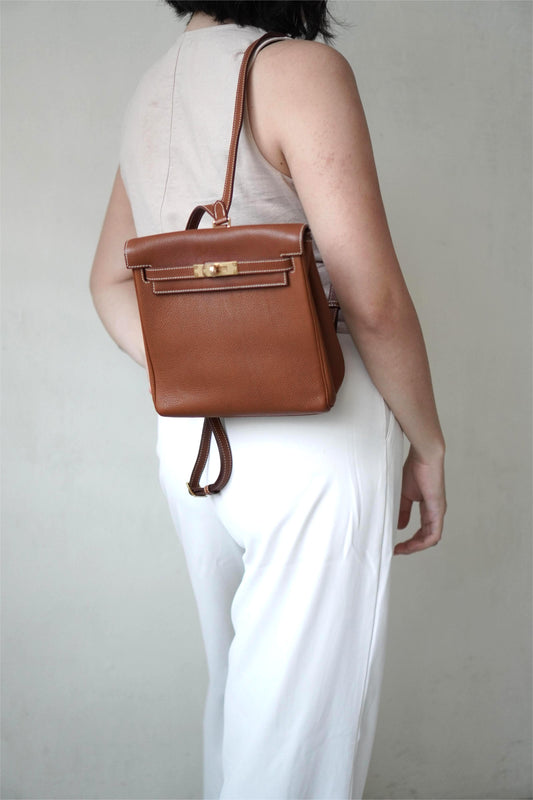 Togo Kelly Ado Backpack in gold (brown) leather