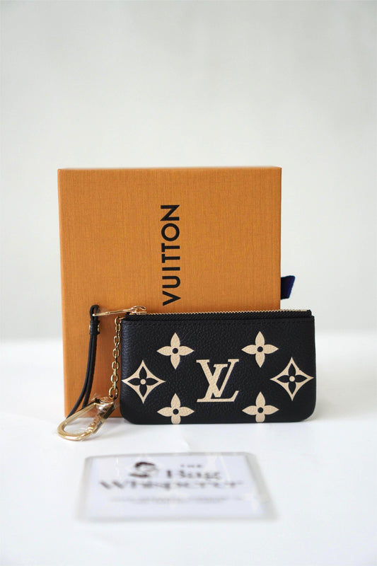 LV Key Pouch in black and beige Bicolor Monogram Empreinte leather
