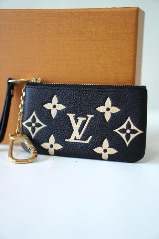 Key Pouch in black and beige Bicolor Monogram Empreinte leather