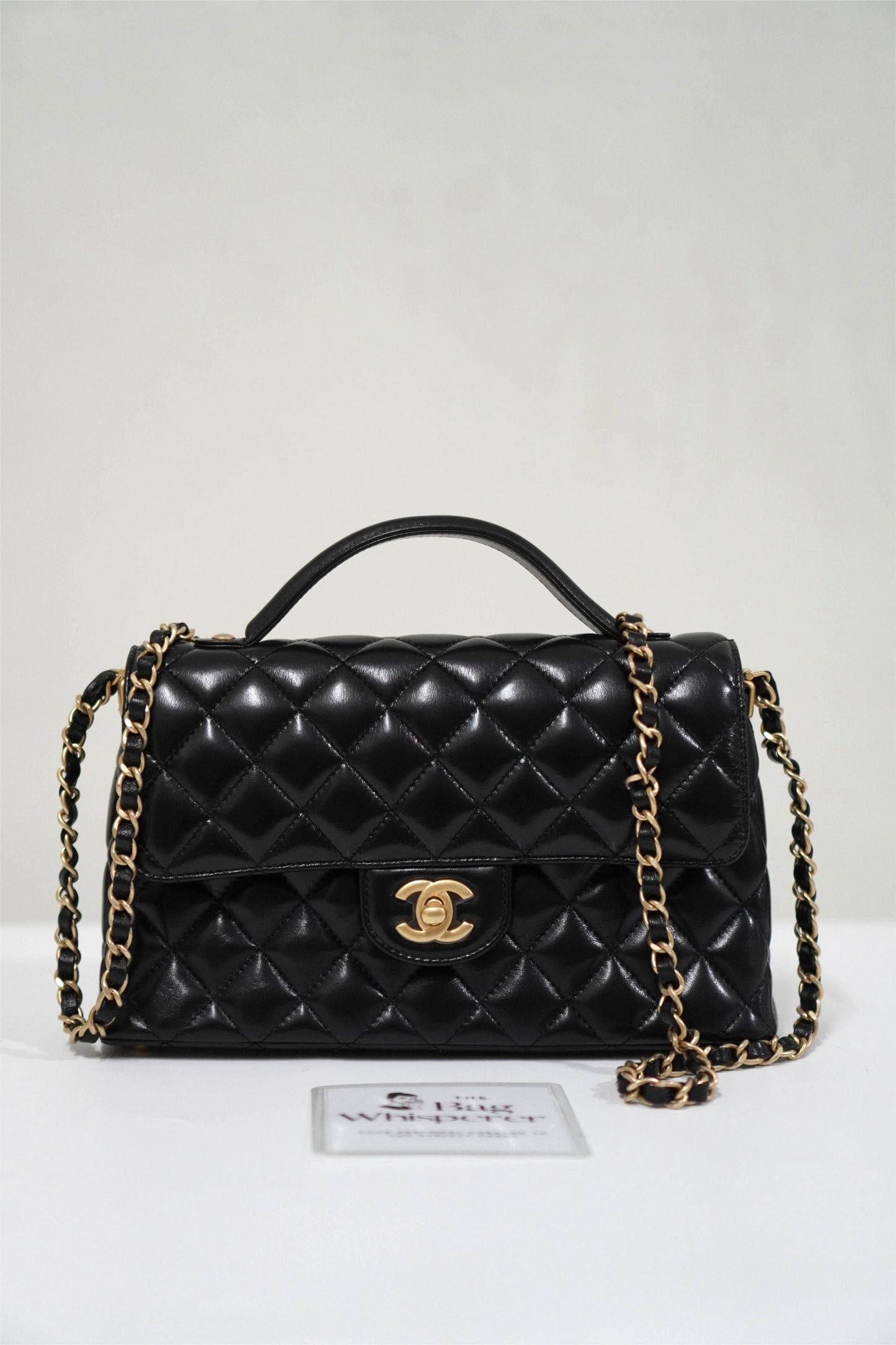 25P Top Handle Flap Bag in Black Shiny Lambskin with Gold Hardware