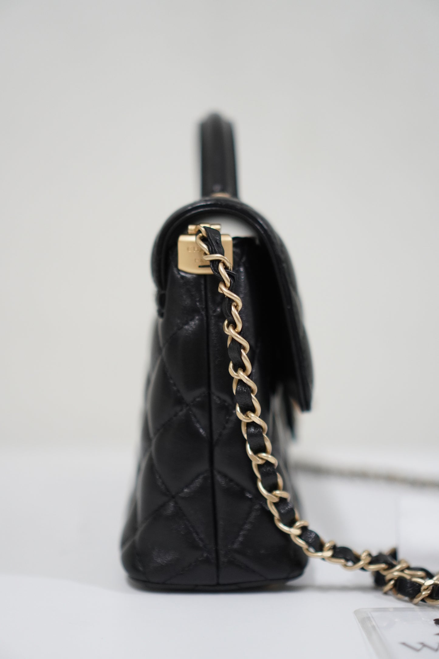 25P Top Handle Flap Bag in Black Shiny Lambskin with Gold Hardware