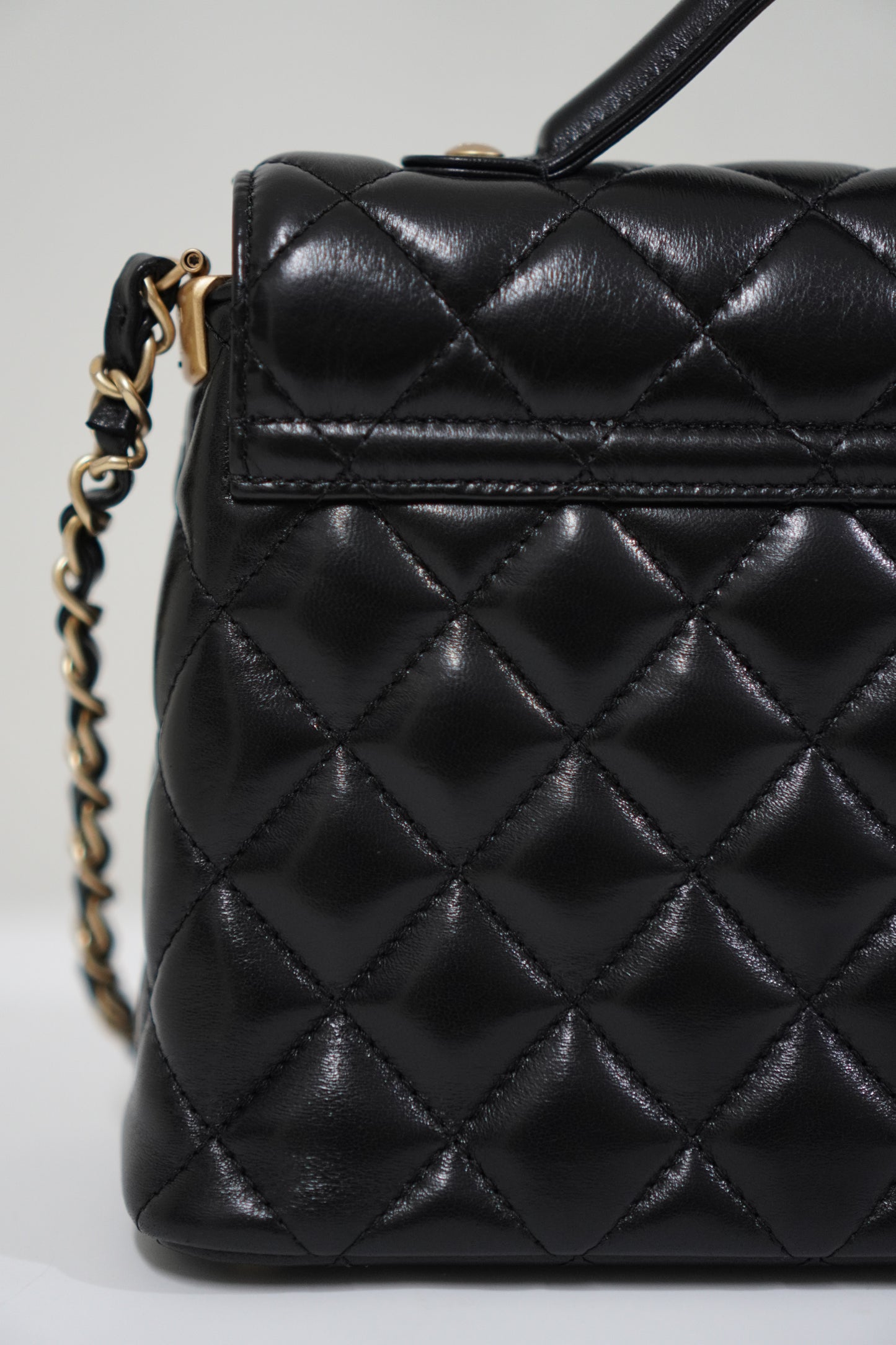 25P Top Handle Flap Bag in Black Shiny Lambskin with Gold Hardware