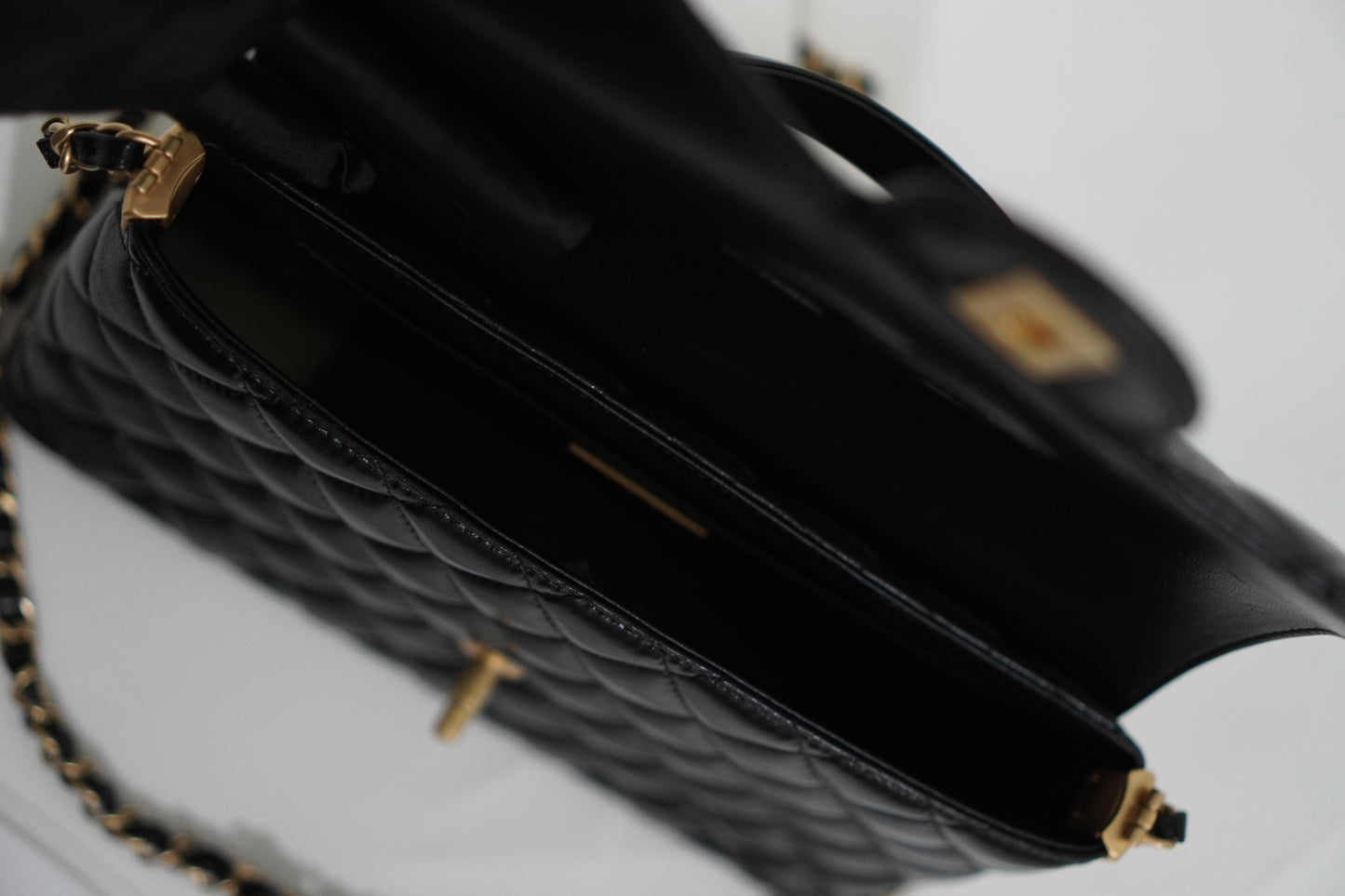 25P Top Handle Flap Bag in Black Shiny Lambskin with Gold Hardware
