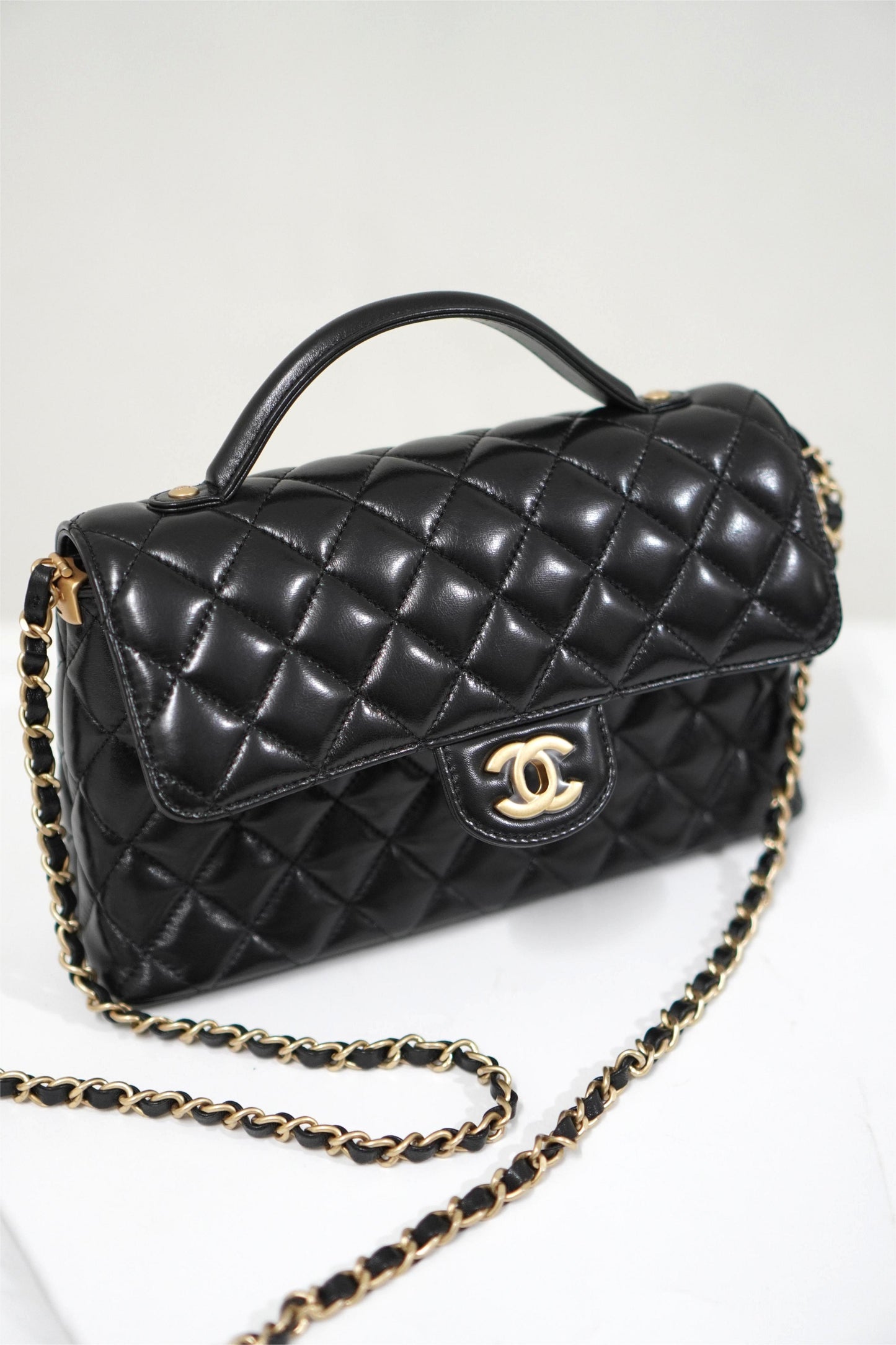 25P Top Handle Flap Bag in Black Shiny Lambskin with Gold Hardware