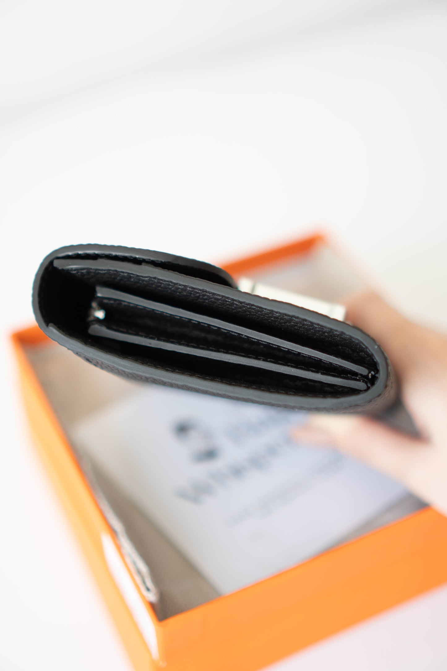 Constanc Wallet – Black Togo Leather with Palladium Hardware • Togo leather with soft pebbled texture